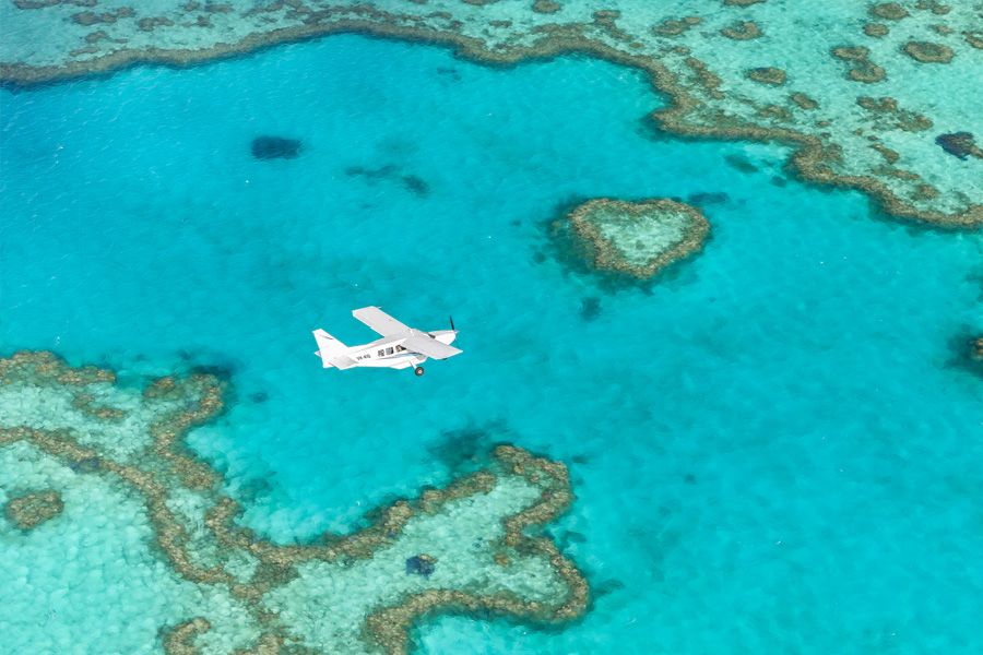 OR: Scenic Flight to Heart Reef Hero Image | East Coast Tours Australia