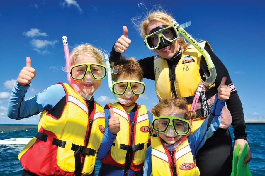 family preparing to go snorkelling in the Whitsundays