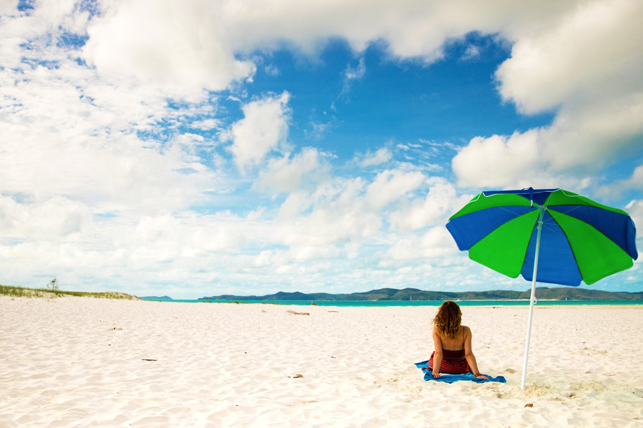 Person on Whitehaven Beach