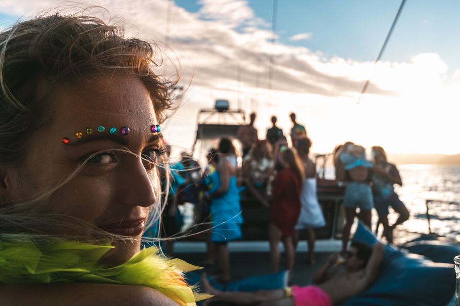 Women at a dress-up party aboard Atlantic Clipper, Whitsundays