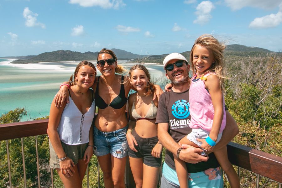 family smiling at Hill Inlet Lookout