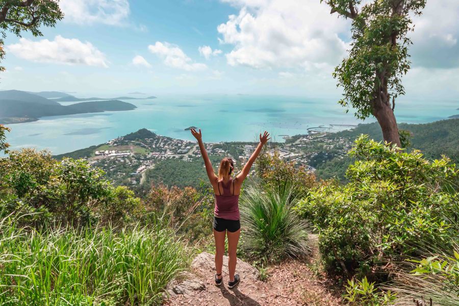 woman posing at the Honey Eater Lookout Airlie Beach