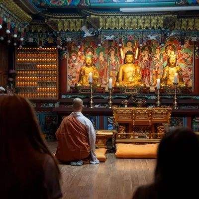 A buddhist temple with golden traditional addornments