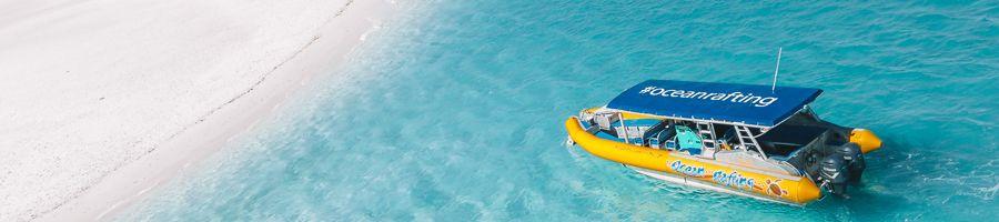ocean rafting boat on whitehaven beach whitsundays