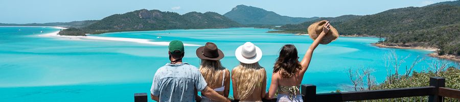 Four people wearing hats at Hill Inlet Lookout, Camira Whitsunday