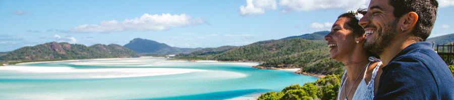 couple smiling at hill inlet lookout