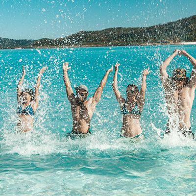 People splashing in the water in the Whitsundays
