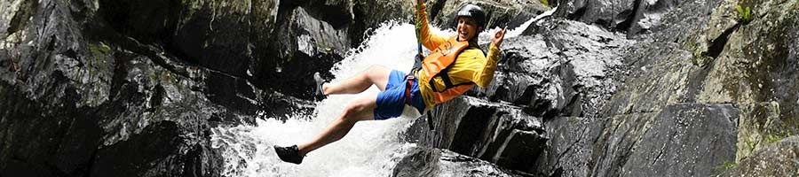 canyoning down a waterfall
