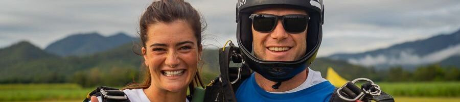 A woman and a skydive instructor