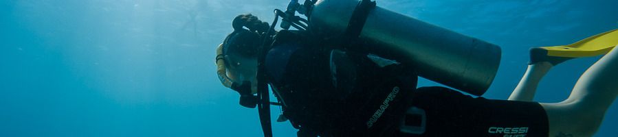 A woman scuba diving underwater