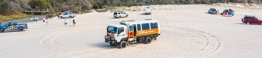 Fraser Adventurer Day Tour bus on the beach