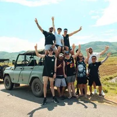 A group of backpackers on a jeep 