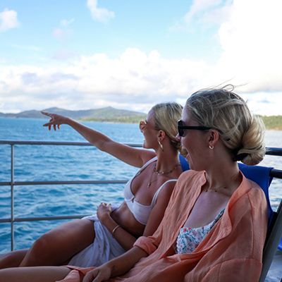 Two women on a cruise boat to Hamilton Island