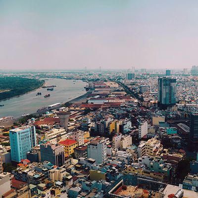 Ho Chi Minh City drone aerial view with river and buildings