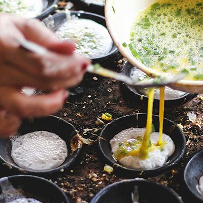 Vietnamese Omlette being poured