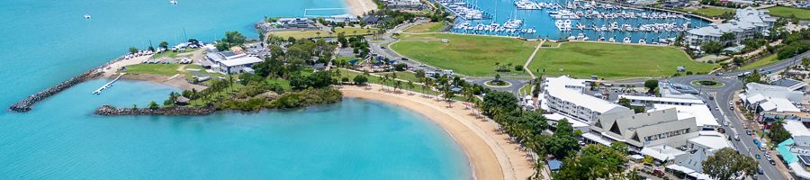 aerial view of airlie beach ocean and downtown