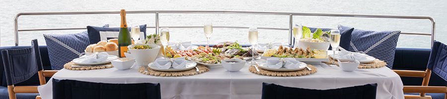 gourmet lunch spread on alani superyacht