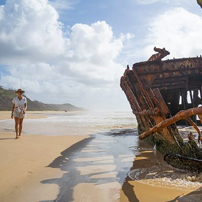 The Maheno Shipwreck with a person in white walking
