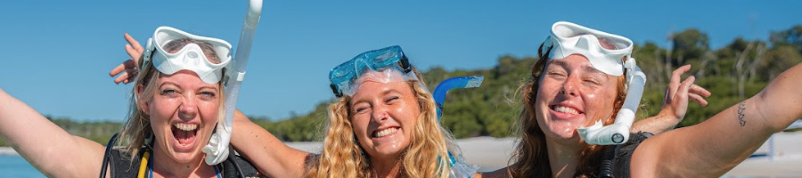 Three women in scuba gear