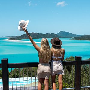 two girls in looking out at Hill Inlet from the lookout