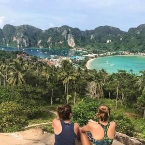 Two girls sitting and admiring the view from Phi Phi Lookout