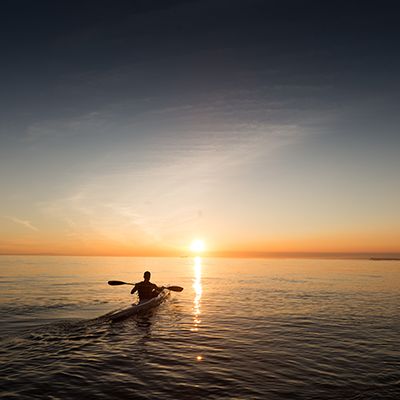 Kayaker at sunrise, Byron