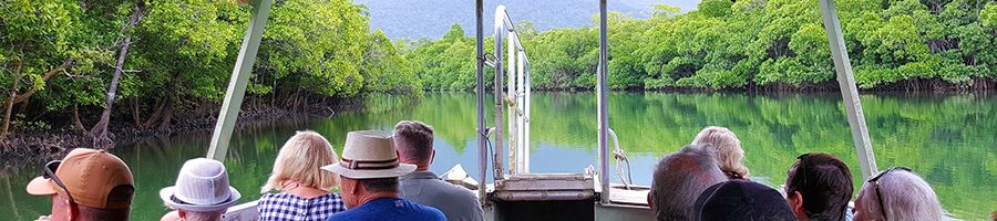 People sitting aboard the Cooper Creek scenic cruise, Daintree National Park