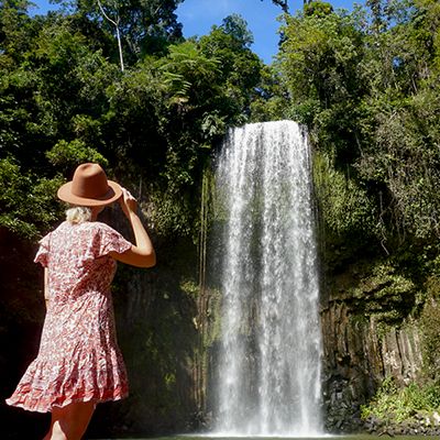 Woman looking at the waterfall