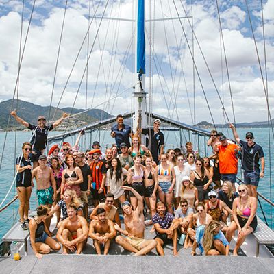 Group of people on a ship in the islands