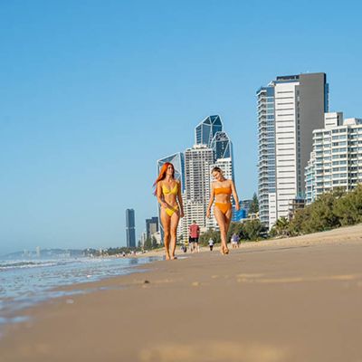 Gold Coast beach with two women walking along
