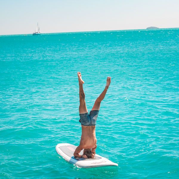 SUP travellers on the water at Whitehaven Beach