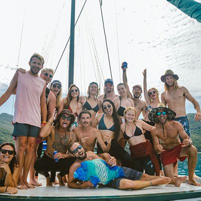 Group of people aboard a social sailing vessel in the Whitsundays
