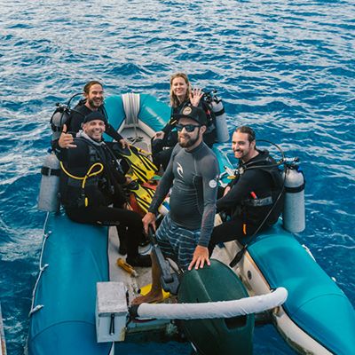 Boat of scuba divers heading to the reef