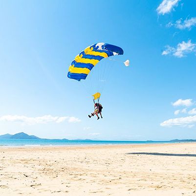 Tandem skydiving beach landing at Mission Beach