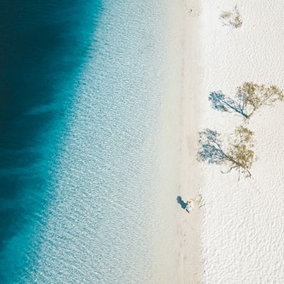 Aerial shot of Lake Mackenzie's blue water and white sand