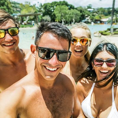 Group of young people in Airlie Beach, swimming 