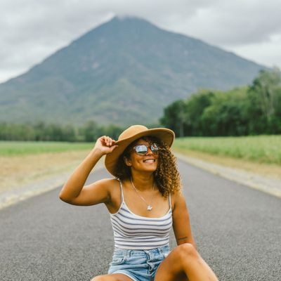 Woman in a hat on the road in front of Walsh's Pyramid