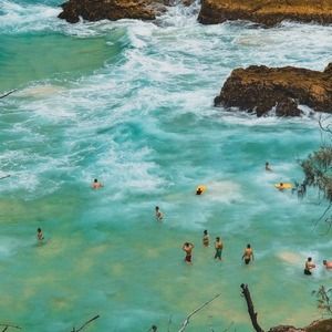 People swimming in the sea on North Stradbroke Island