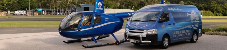 airlie beach helicopters and transfer van at airport