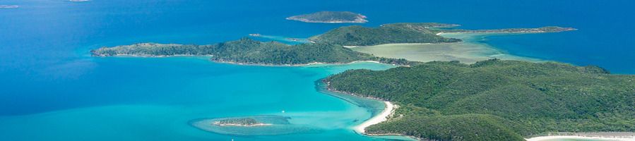 Aerial shot of the Whitsunday Islands during a scenic flight