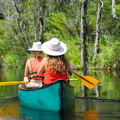 girls canoeing on the Noosa Everglades