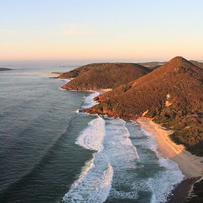 sunrise over port stephens beaches from Tomaree Mountain