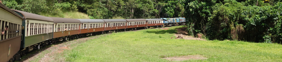 Kuranda Scenic Railway Train winding around the mountain range