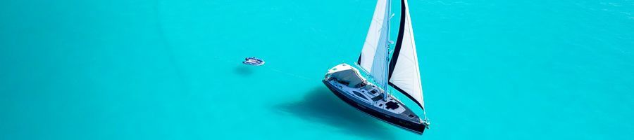 milady sailing over the turquoise ocean