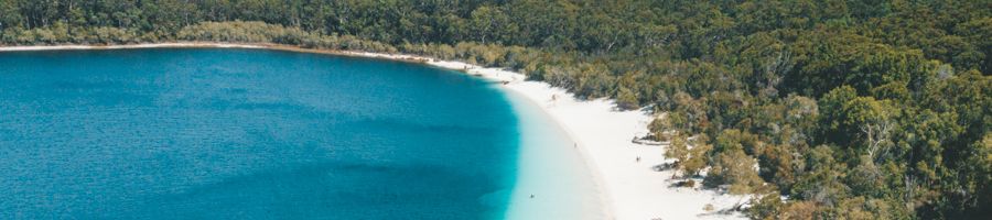 aerial view of lake mckenzie blue water and white sand