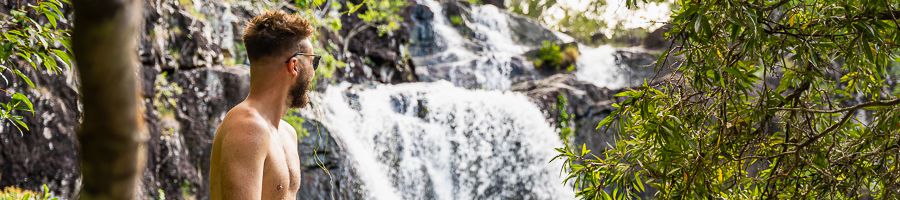 A man at the Cedar Creek waterfall