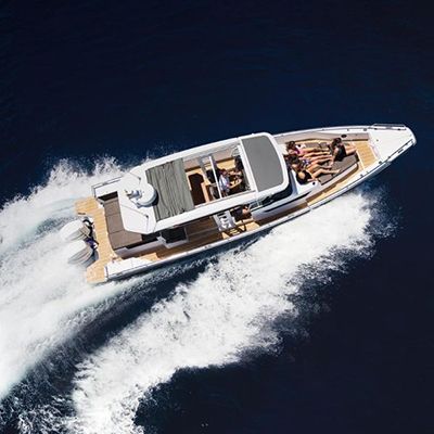 aerial view of a sports yacht cruising through sydney harbour