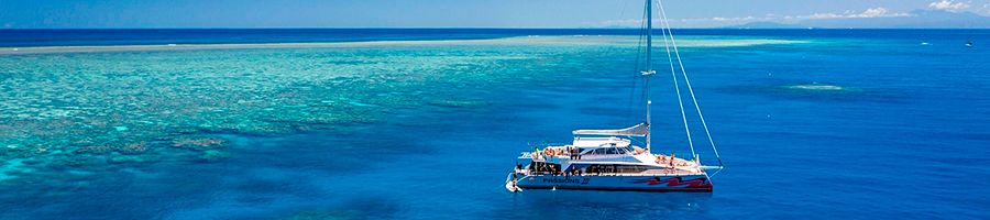 passions of paradise sailing catamaran on the reef