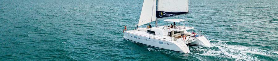 sailaway catamaran on the ocean near port douglas