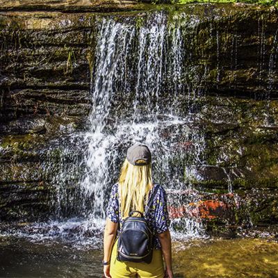 girl viewing a waterfall in the blue mountains